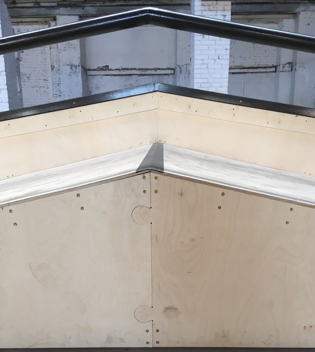 Corner of a Format festival obstacle with a steel coping edge