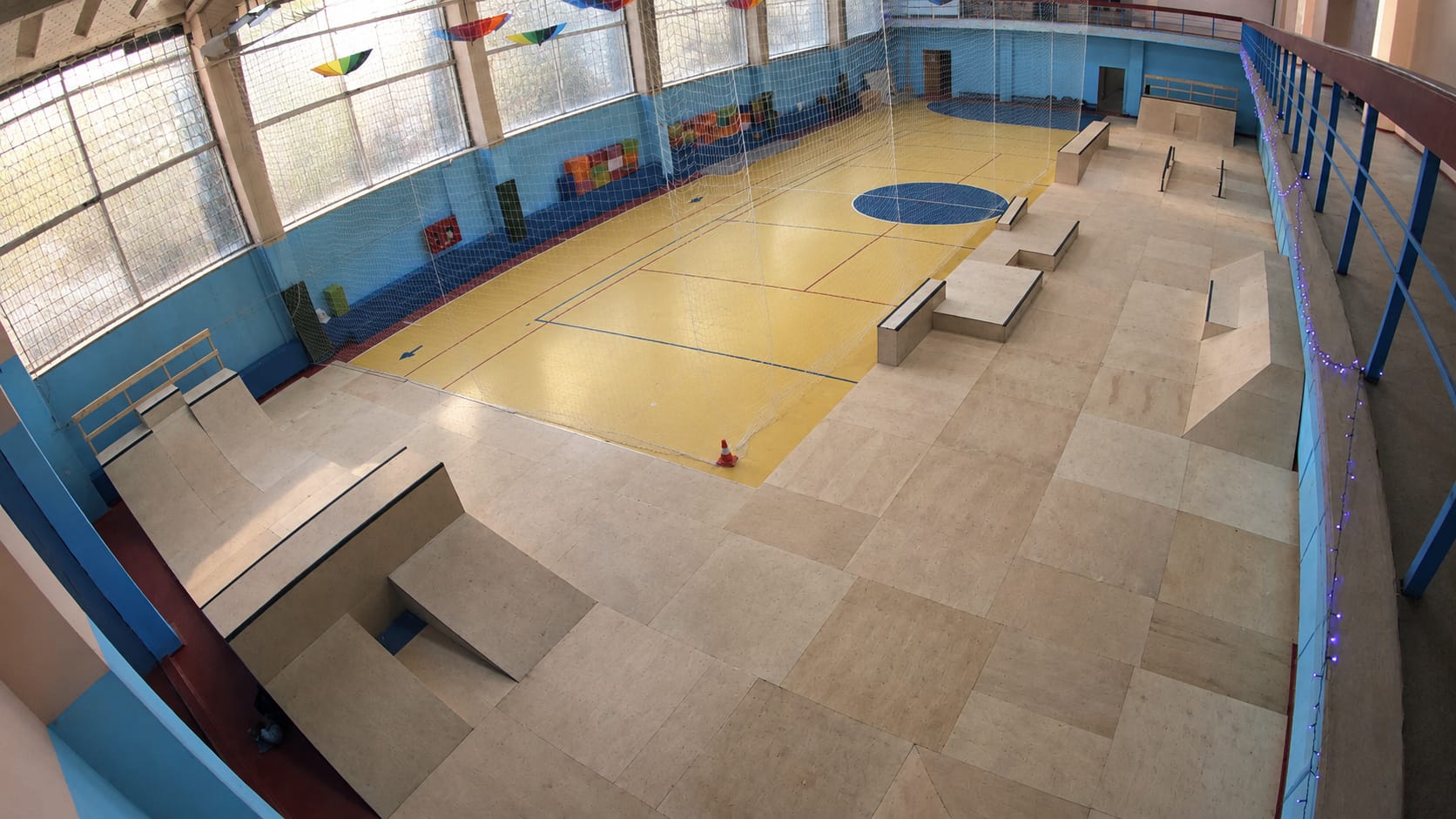 Overview of the SPOT park in Omsk laid out along the side of a sports hall
