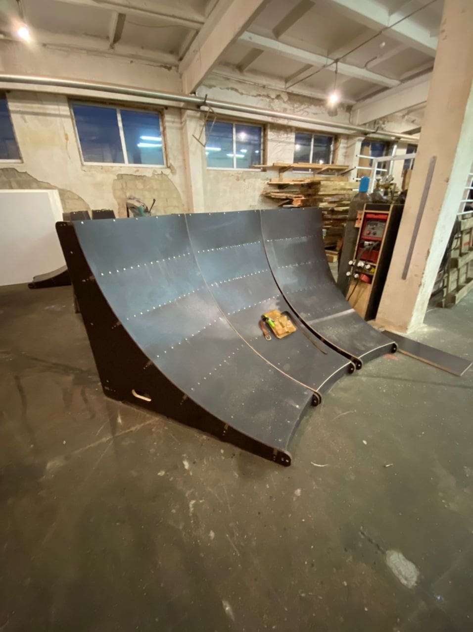 Quarter pipe section finished in dark plywood