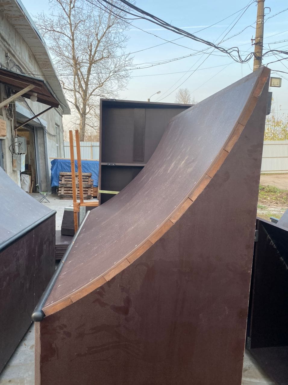 Large quarter pipe outside, ready for shipping