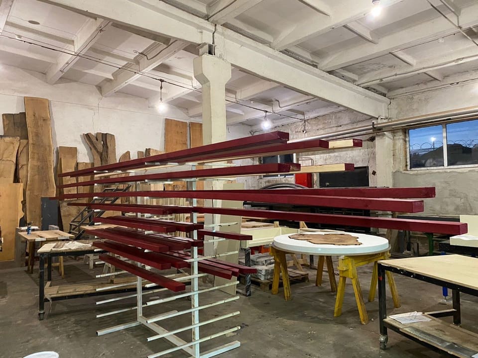 Red steel rails and coping on a rack